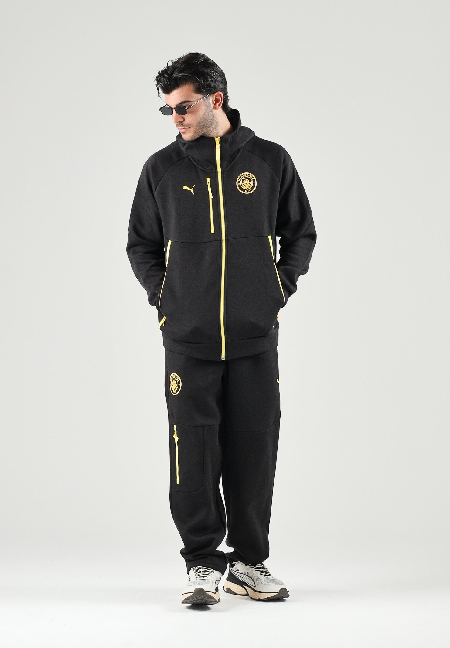 PUMA Felpa con zip MANCHESTER CITY TRAVEL HOODIE nero da uomo con cerniera oro a contrasto 786264 27 PUMA 