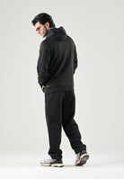PUMA Pantaloni MANCHESTER CITY TRAVEL PANTS nero da uomo con zip dorata e stemma del club applicato. 786265 27 PUMA 