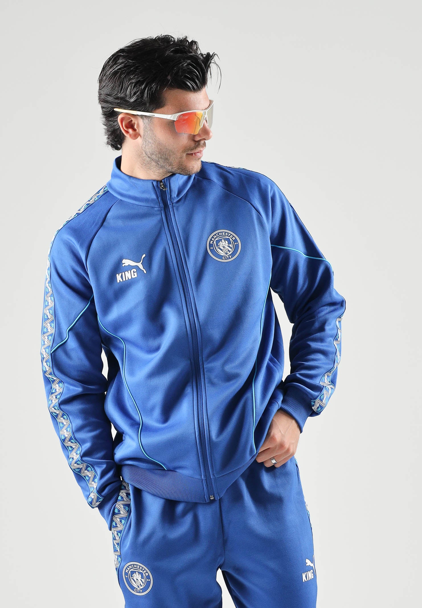 PUMA Felpa con zip MANCHESTER CITY TRACK JACKET blu da uomo  stemma ufficiale del club. 786296 31 PUMA 