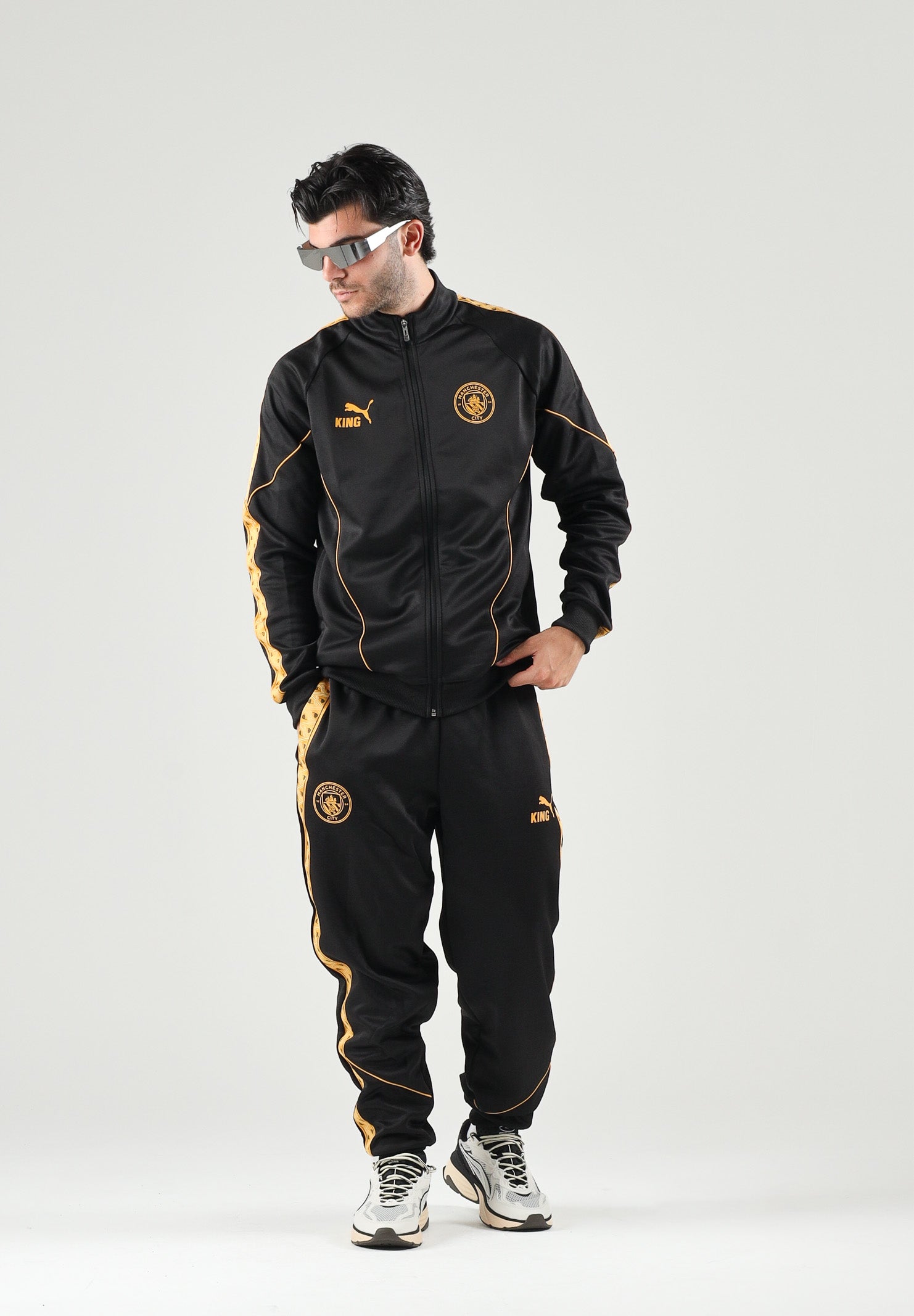 PUMA Felpa con zip MANCHESTER CITY TRACK JACKET nero da uomo  dettagli oro. 786296 32 PUMA 
