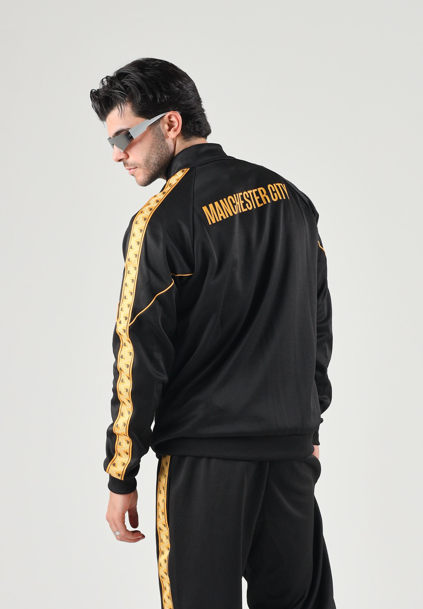 PUMA Felpa con zip MANCHESTER CITY TRACK JACKET nero da uomo  dettagli oro. 786296 32 PUMA 