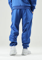 PUMA Pantaloni MANCHESTER CITY TRACK PANTS blu da uomo con bande laterali lavorate e caviglie con polsino. 786297 31 PUMA 