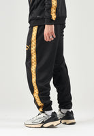 PUMA Pantaloni MANCHESTER CITY TRACK PANTS nero da uomo con profili dorati sui fianchi e girovita elastico. 786297 32 PUMA 