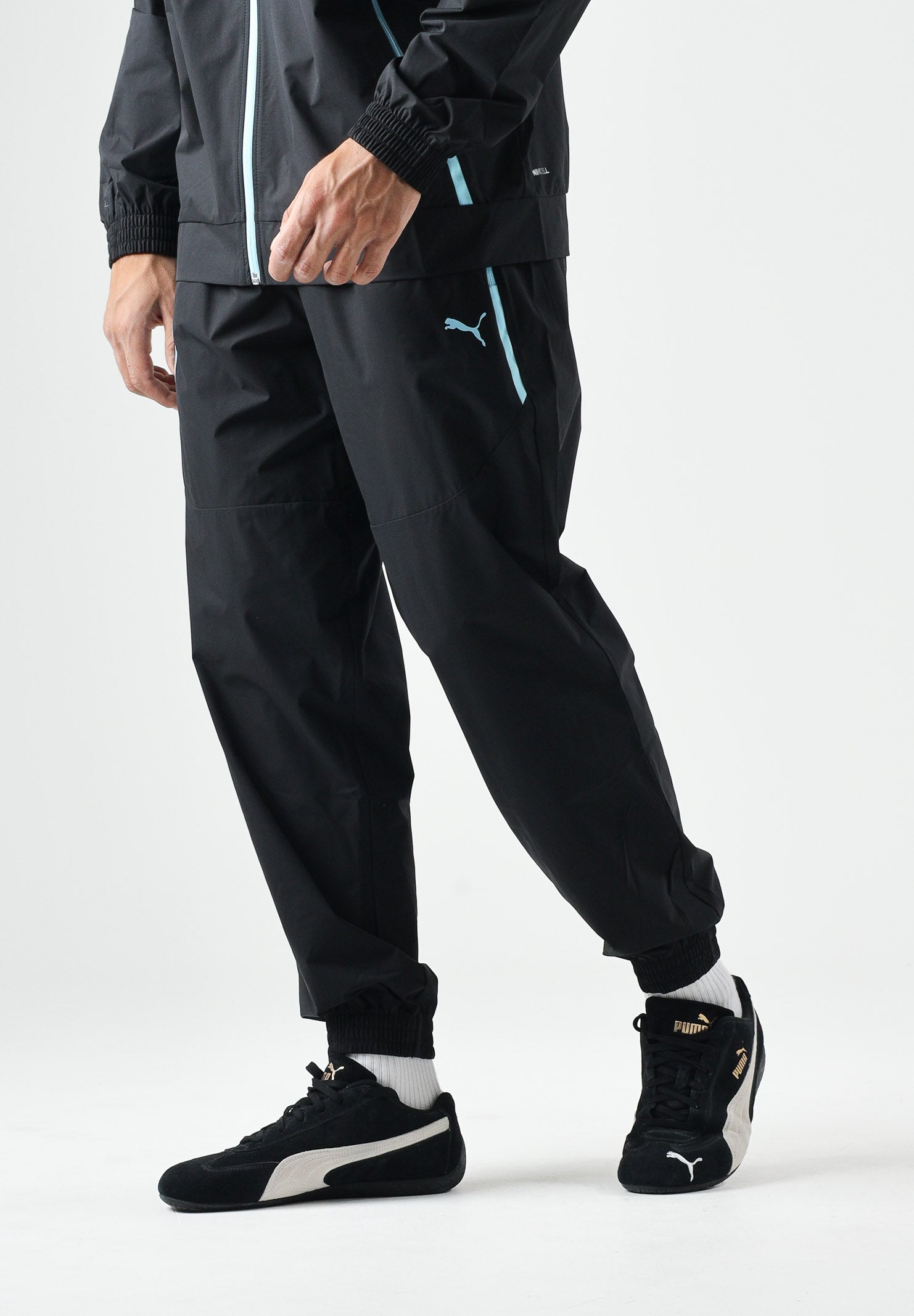 PUMA Pantaloni OLYMPIQUE DE MARSEILLE vibrant blue, blu e nero da uomo con dettagli logo e stemma 786450 20 PUMA 