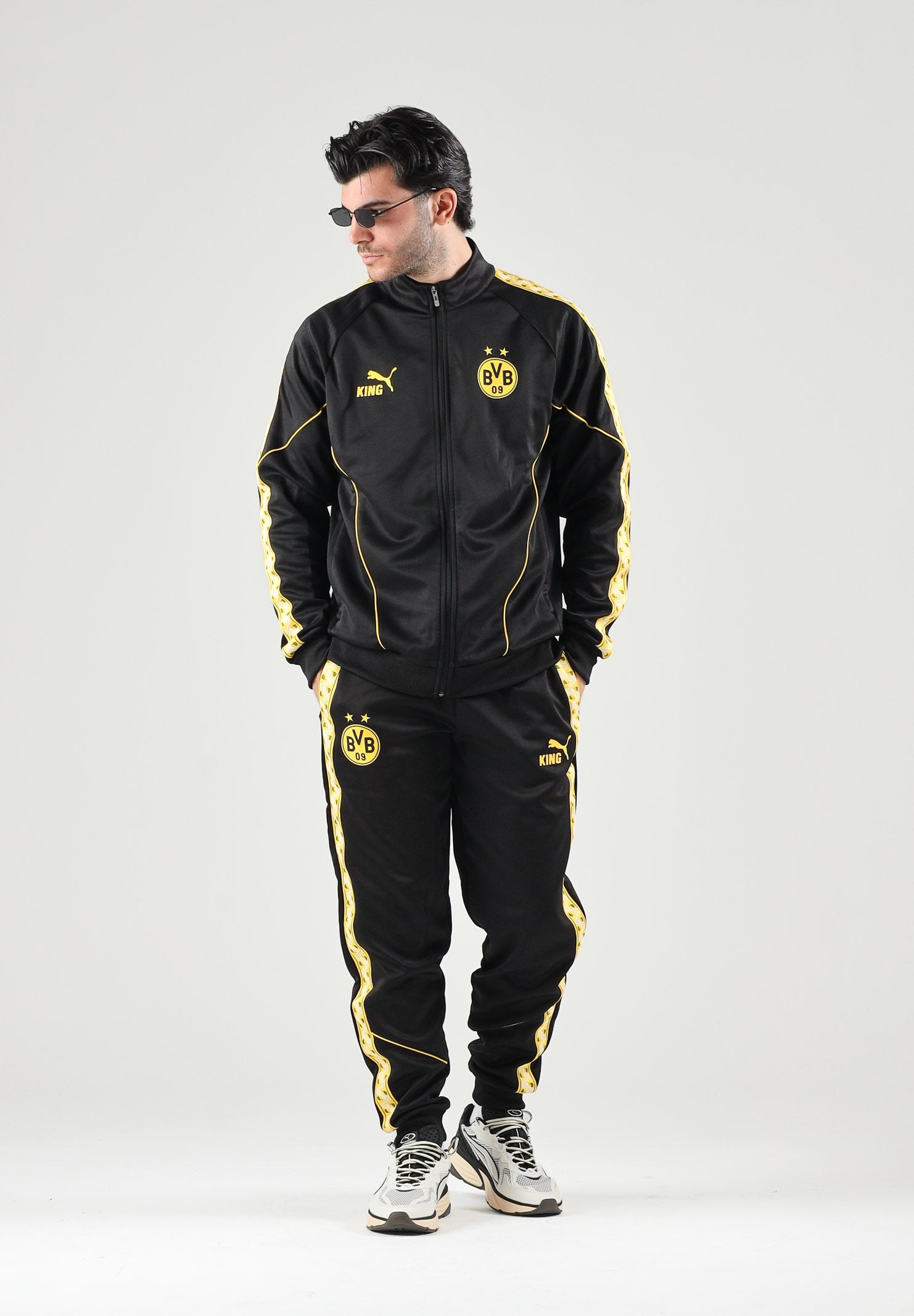 PUMA Felpa con zip BORUSSIA DORTMUND  nero da uomo con dettagli gialli e stemma del club. 786491 07 PUMA 