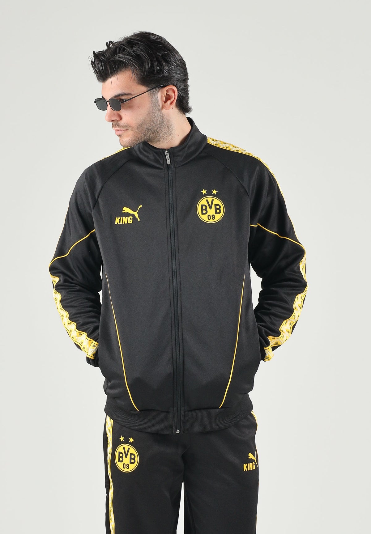 PUMA Felpa con zip BORUSSIA DORTMUND  nero da uomo con dettagli gialli e stemma del club. 786491 07 PUMA 