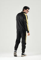 PUMA Pantaloni BORUSSIA DORTMUND TRACK PANTS nero da uomo con bande laterali gialle e caviglie elasticizzate. 786492 07 PUMA 