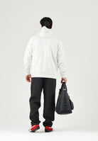 PUMA Felpa AC MILAN TRAVEL HOODIE panna da uomo con cappuccio integrato e zip rosse a contrasto. 786685 15 PUMA 