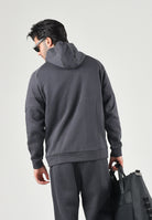 PUMA Felpa con zip AC MILAN TRAVEL HOODIE nero da uomo con cerniera e dettagli rossi a contrasto. 786685 20 PUMA 