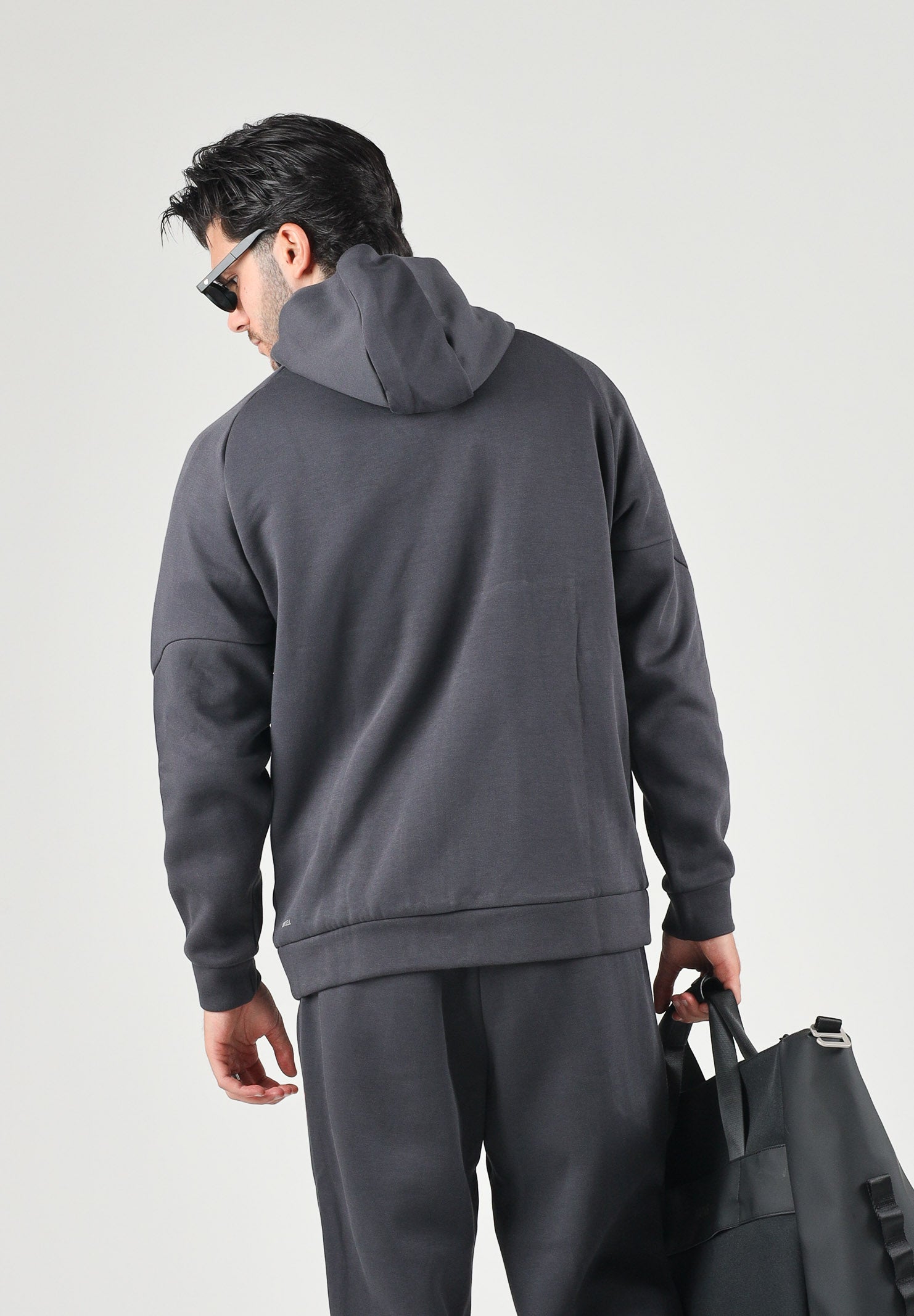 PUMA Felpa con zip AC MILAN TRAVEL HOODIE nero da uomo con cerniera e dettagli rossi a contrasto. 786685 20 PUMA 
