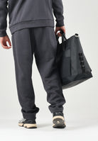 PUMA Pantaloni AC MILAN TRAVEL PANTS nero da uomo con tasca zippata rossa a contrasto e stemma del club. 786686 20 PUMA 