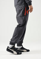 PUMA Pantaloni AC MILAN dark-black, nero da uomo con dettagli a contrasto 786700 20 PUMA 