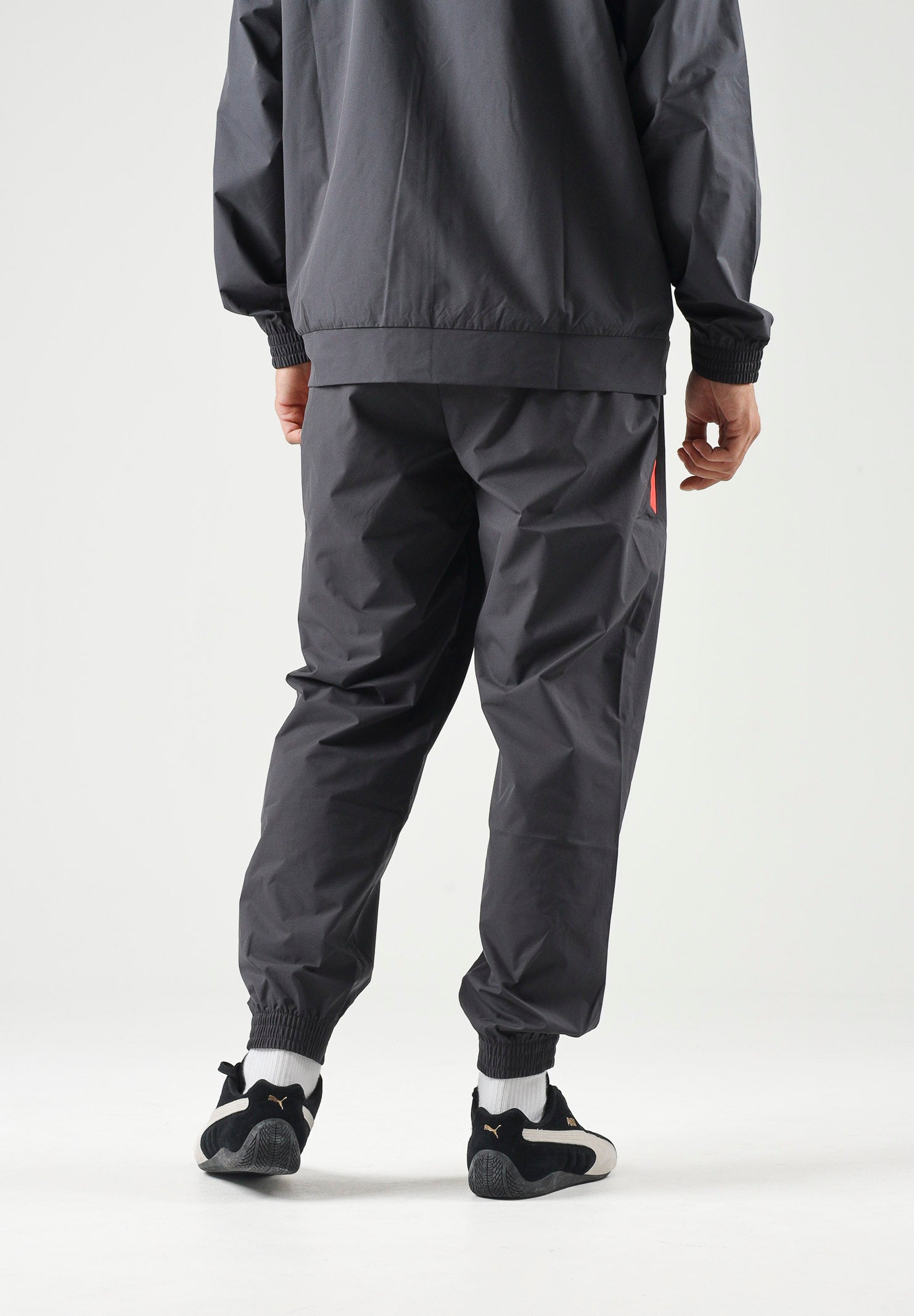 PUMA Pantaloni AC MILAN dark-black, nero da uomo con dettagli a contrasto 786700 20 PUMA 