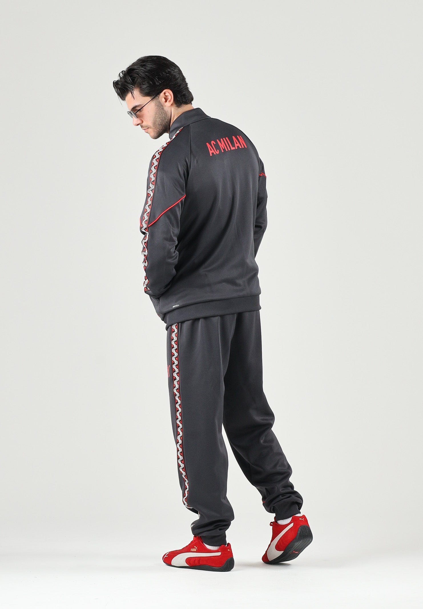 PUMA Felpa con zip  AC MILAN TRACK JACKET nero da uomo con colletto alto e profili rossi. 786735 17 PUMA 