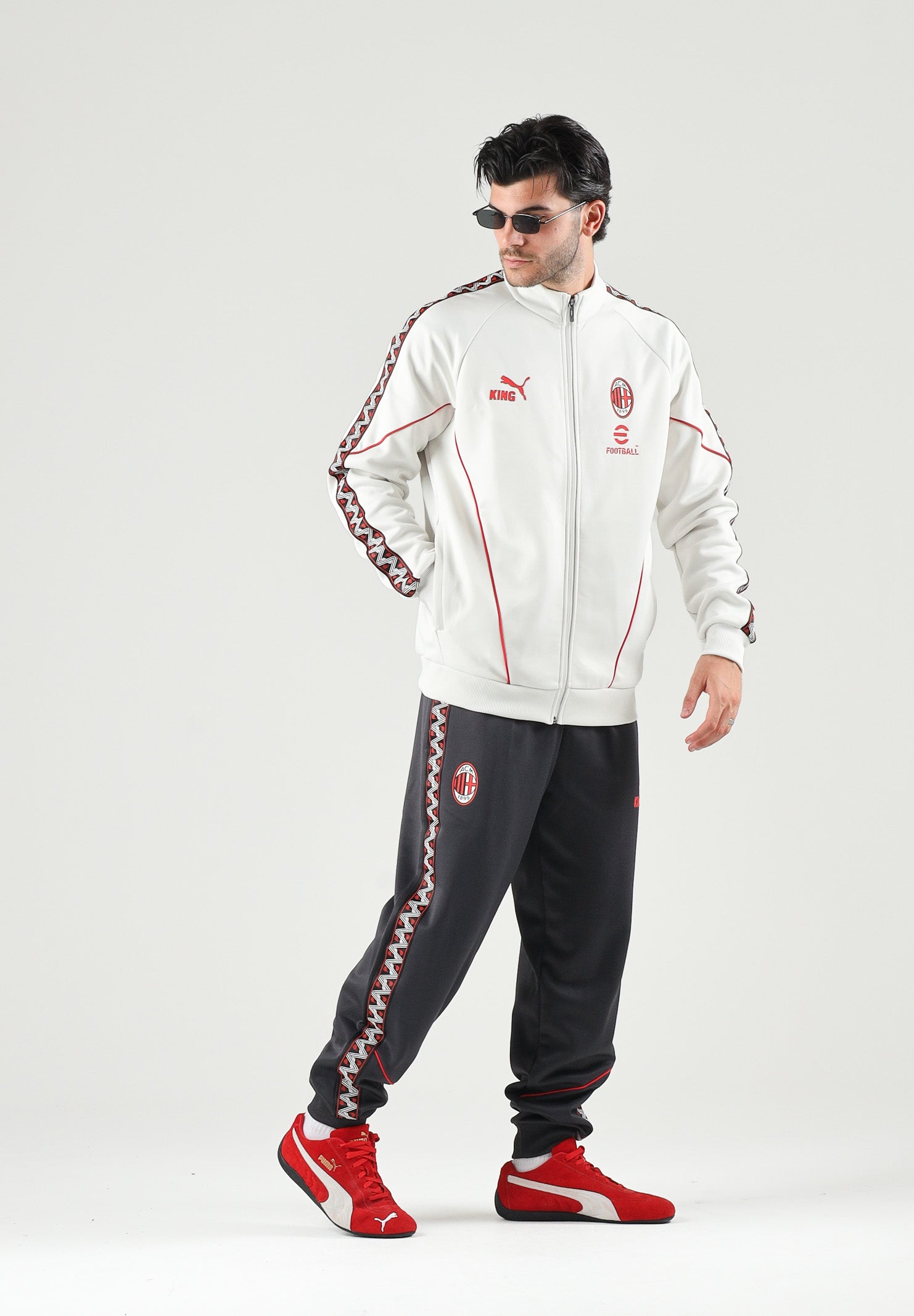 PUMA Felpa con zip  AC MILAN TRACK JACKET bianco da uomo con colletto dritto e sottili profili rossi. 786735 18 PUMA 