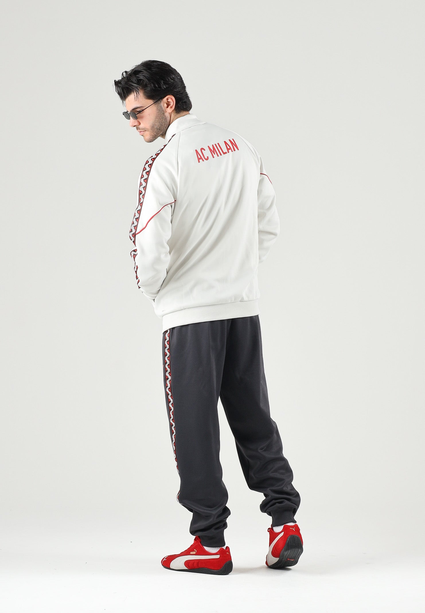 PUMA Felpa con zip  AC MILAN TRACK JACKET bianco da uomo con colletto dritto e sottili profili rossi. 786735 18 PUMA 