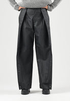 RAINS Pantaloni HEAVY WOVEN PANTS WIDE neri per uomo e donna con gamba ampia, pieghe frontal. RA19180 BL RAINS 