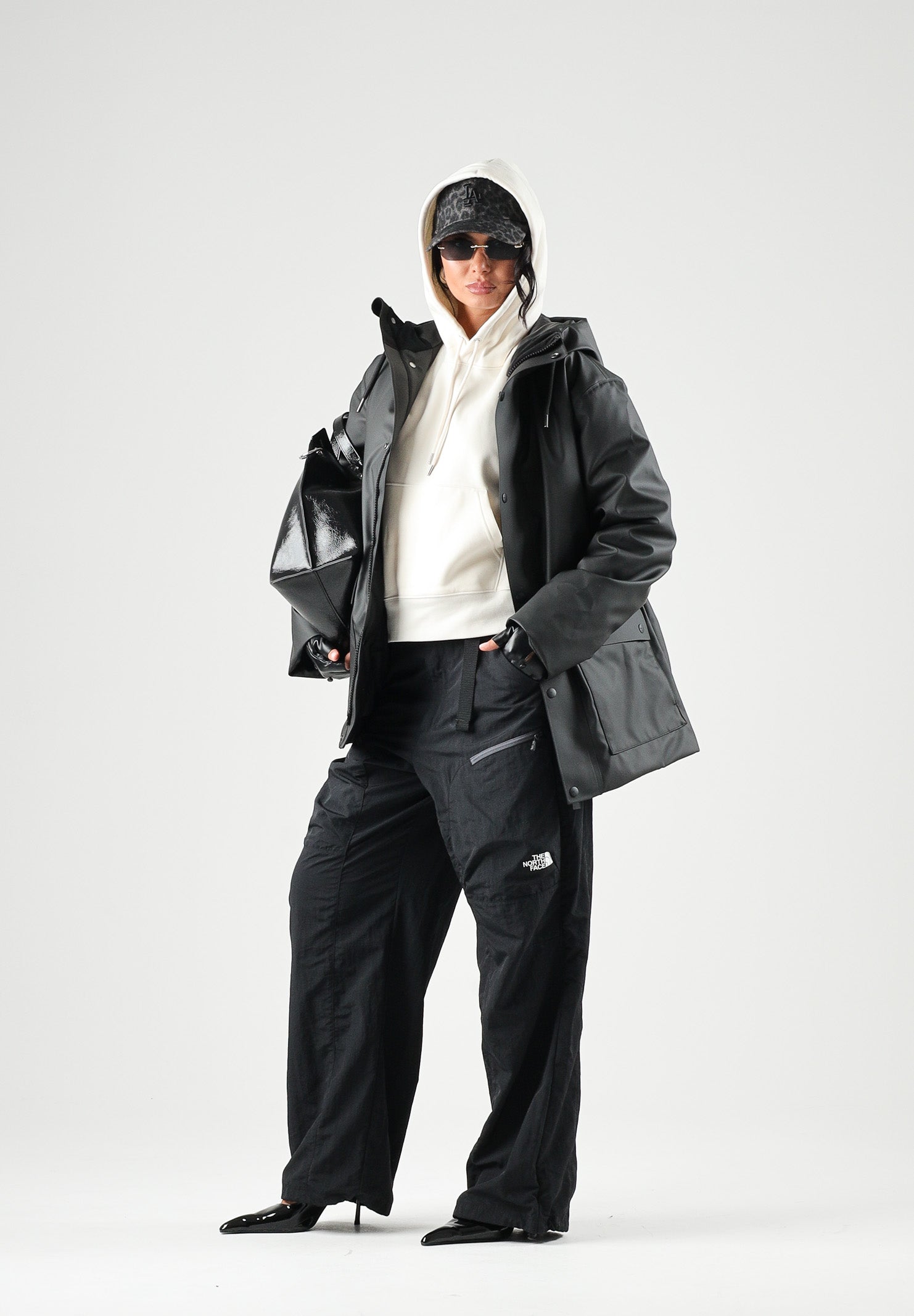 RAINS Parka nero per uomo e donna con cappuccio e visiera RA21450 BL RAINS 
