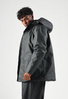 RAINS Parka nero per uomo e donna con cappuccio e visiera RA21450 BL RAINS 