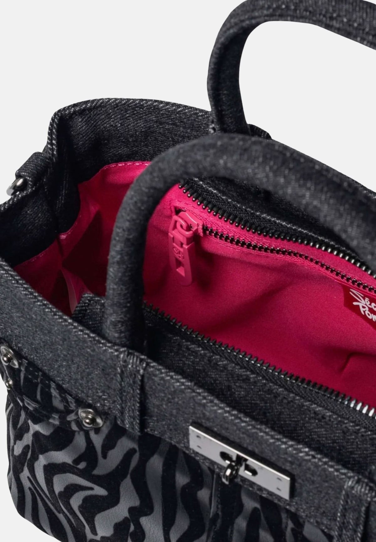 SECRET PON PON Borsa a mano KELSY ZEBRA Black nera da donna,  con fantasia zebrata, doppi manici e tracolla regolabile.<BR/> KELSY-ZEBRA ZE SECRET PON PON 