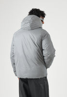 SPRAYGROUND Piumino grigio reversibile  per uomo e donna con cappuccio regolabile, chiusura frontale con zip SP942 . SPRAYGROUND 