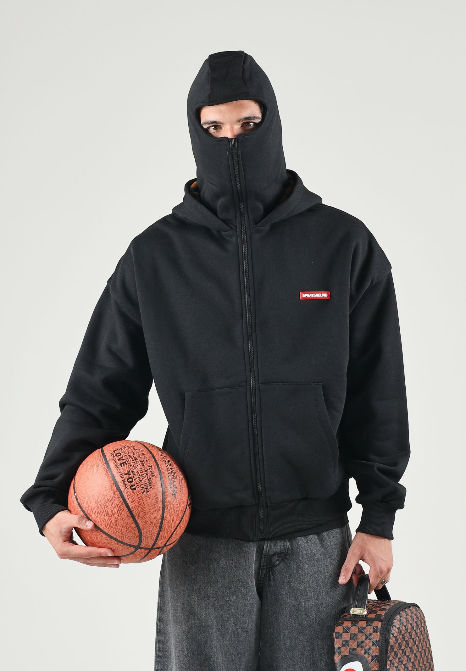 SPRAYGROUND Felpa con zip  HOODIE nera per uomo e donna con dettaglio maschera balaclava. SP957G . SPRAYGROUND 