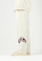 SPRAYGROUND Pantaloni panna per uomo e donna con comodo elastico in vita e dettagli grafici distintivi lungo la gamba. SP995GIVO . SPRAYGROUND 