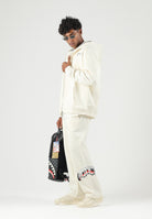 SPRAYGROUND Pantaloni panna per uomo e donna con comodo elastico in vita e dettagli grafici distintivi lungo la gamba. SP995GIVO . SPRAYGROUND 