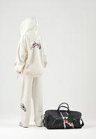 SPRAYGROUND Pantaloni panna per uomo e donna con comodo elastico in vita e dettagli grafici distintivi lungo la gamba. SP995GIVO . SPRAYGROUND 