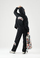 SPRAYGROUND Felpa con zip nera per uomo e donna con cappuccio e tasche laterali. SP997GBLK . SPRAYGROUND 