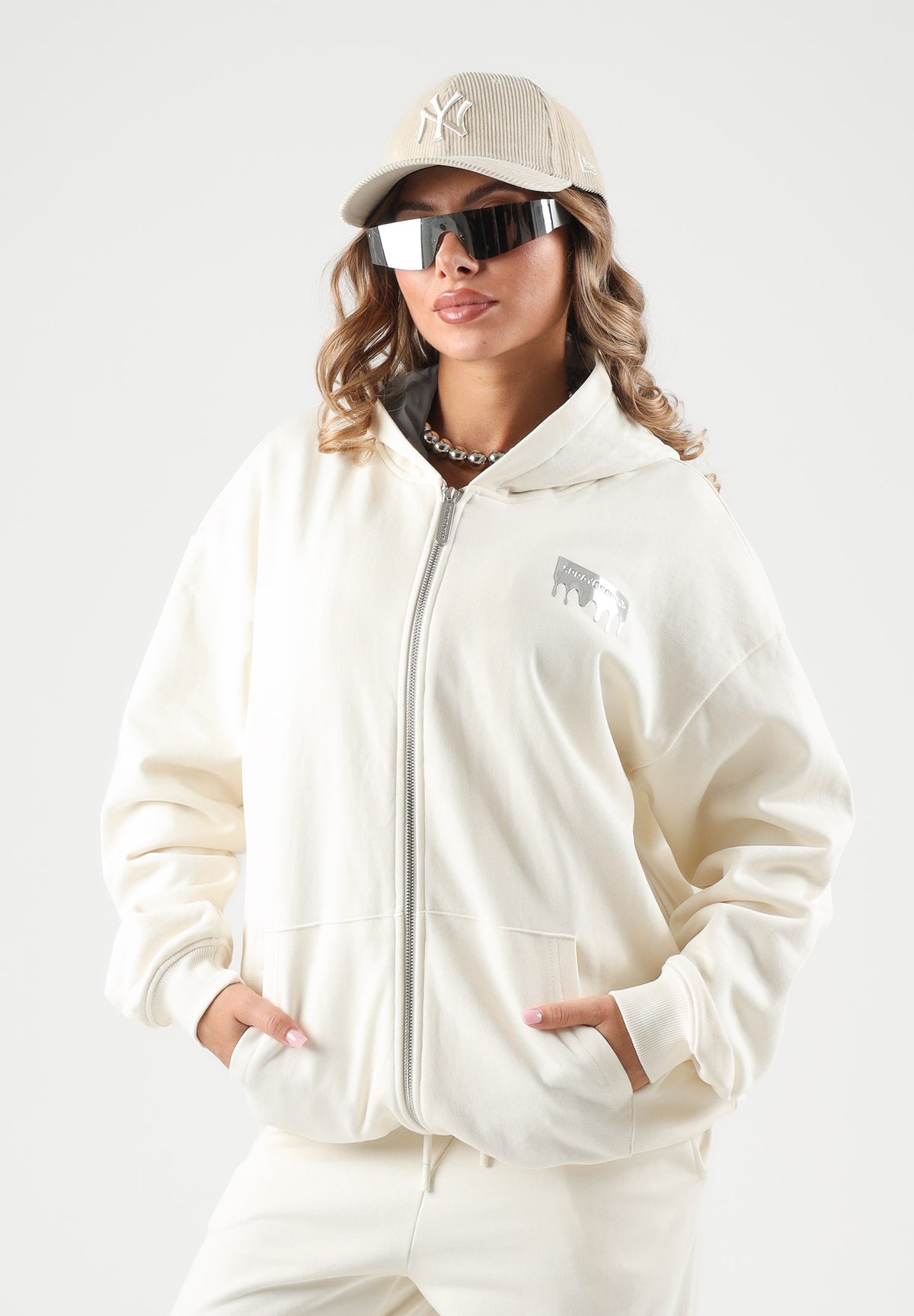 SPRAYGROUND Felpa con zip panna  per uomo e donna con cappuccio e tasche laterali. SP997GIVO . SPRAYGROUND 