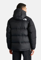 THE NORTH FACE Piumino Himalayan nero da uomo con logo laterale NF0A4QYXGOF1 . THE NORTH FACE 