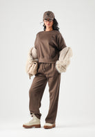 THE NORTH FACE Pantaloni SIMPLE DOME PANT marroni da donna con elastico in vita e polsini alle caviglie. NF0A8CWD1OI1 . THE NORTH FACE 