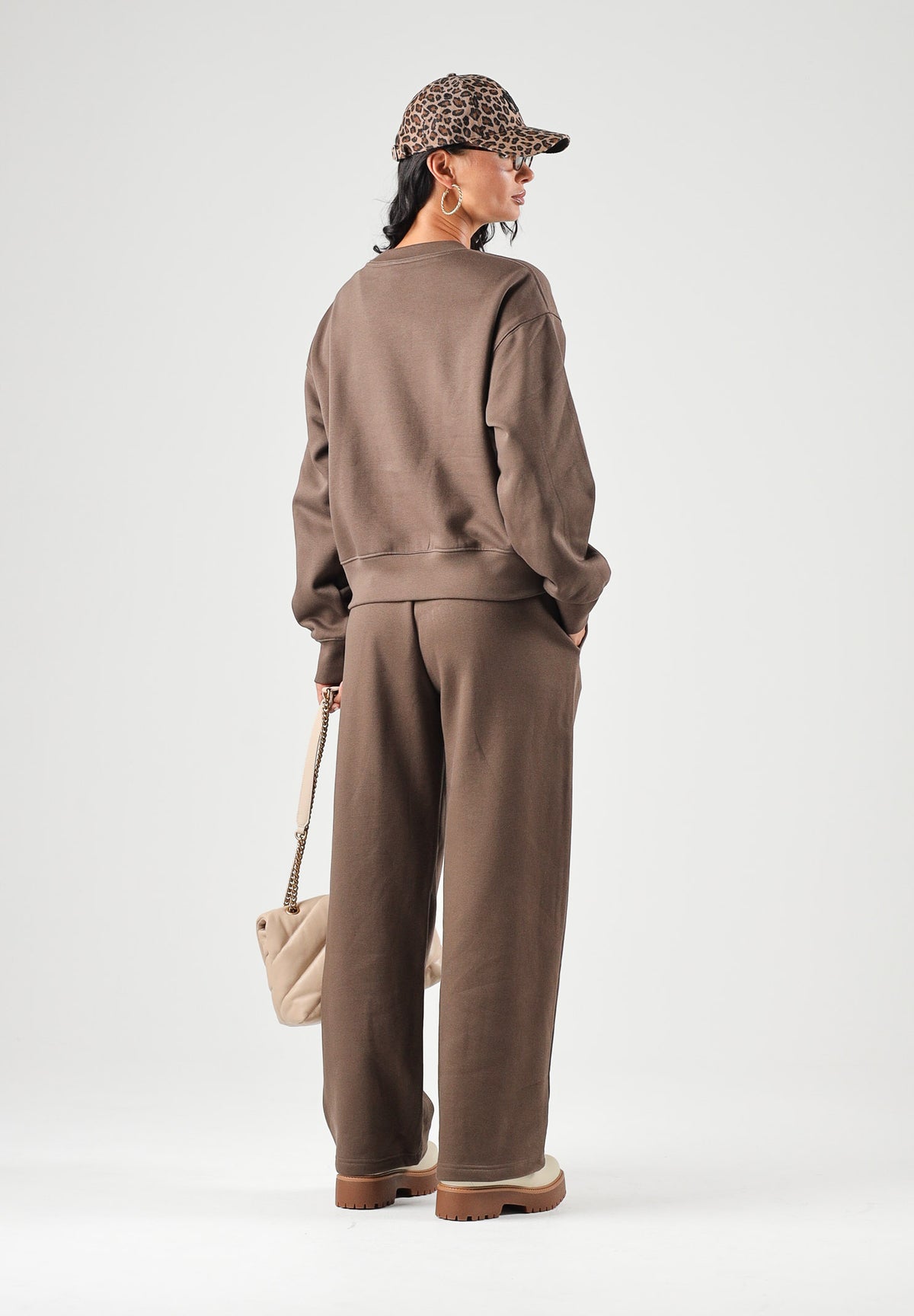 THE NORTH FACE Pantaloni SIMPLE DOME PANT marroni da donna con elastico in vita e polsini alle caviglie. NF0A8CWD1OI1 . THE NORTH FACE 