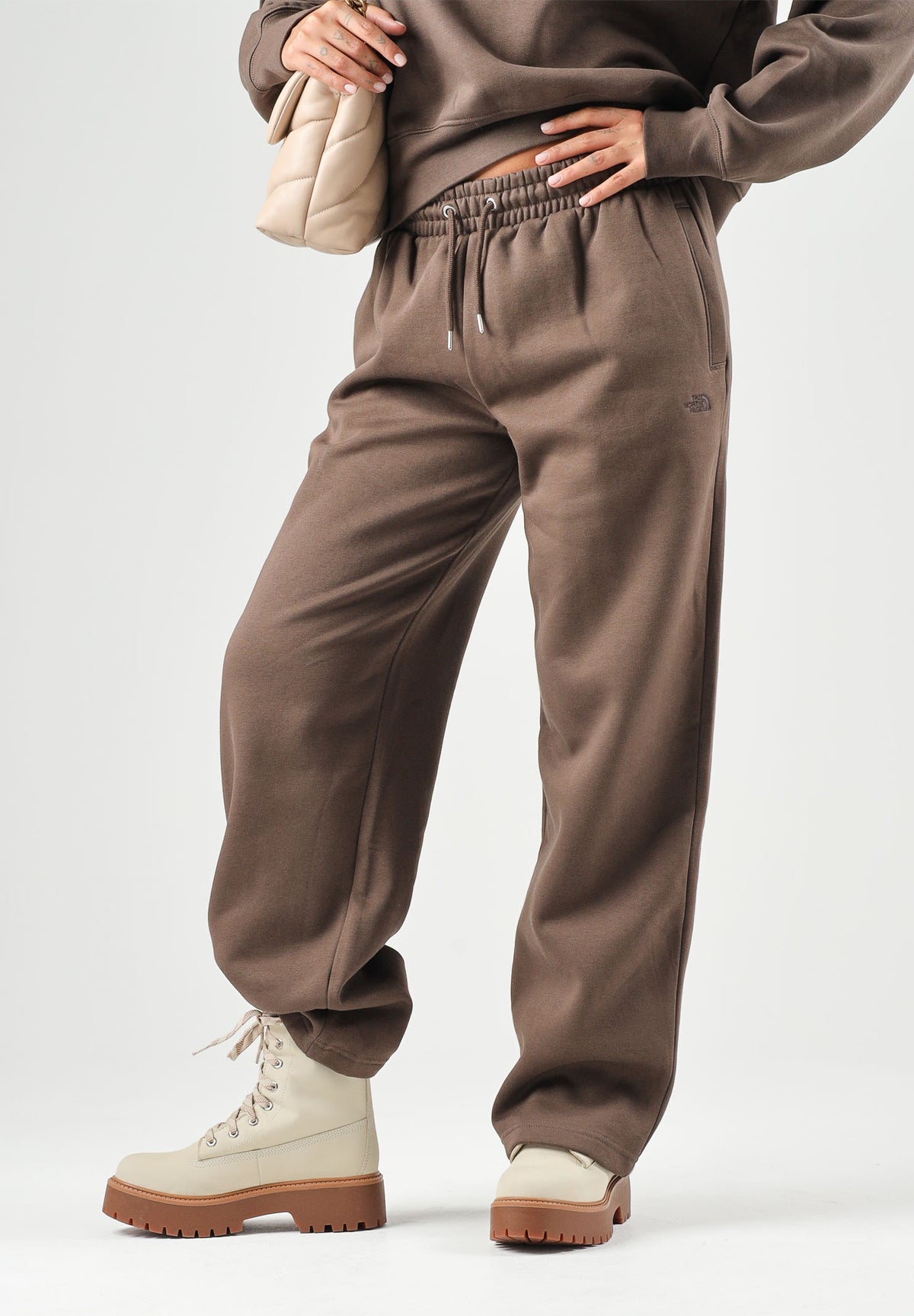 THE NORTH FACE Pantaloni SIMPLE DOME PANT marroni da donna con elastico in vita e polsini alle caviglie. NF0A8CWD1OI1 . THE NORTH FACE 