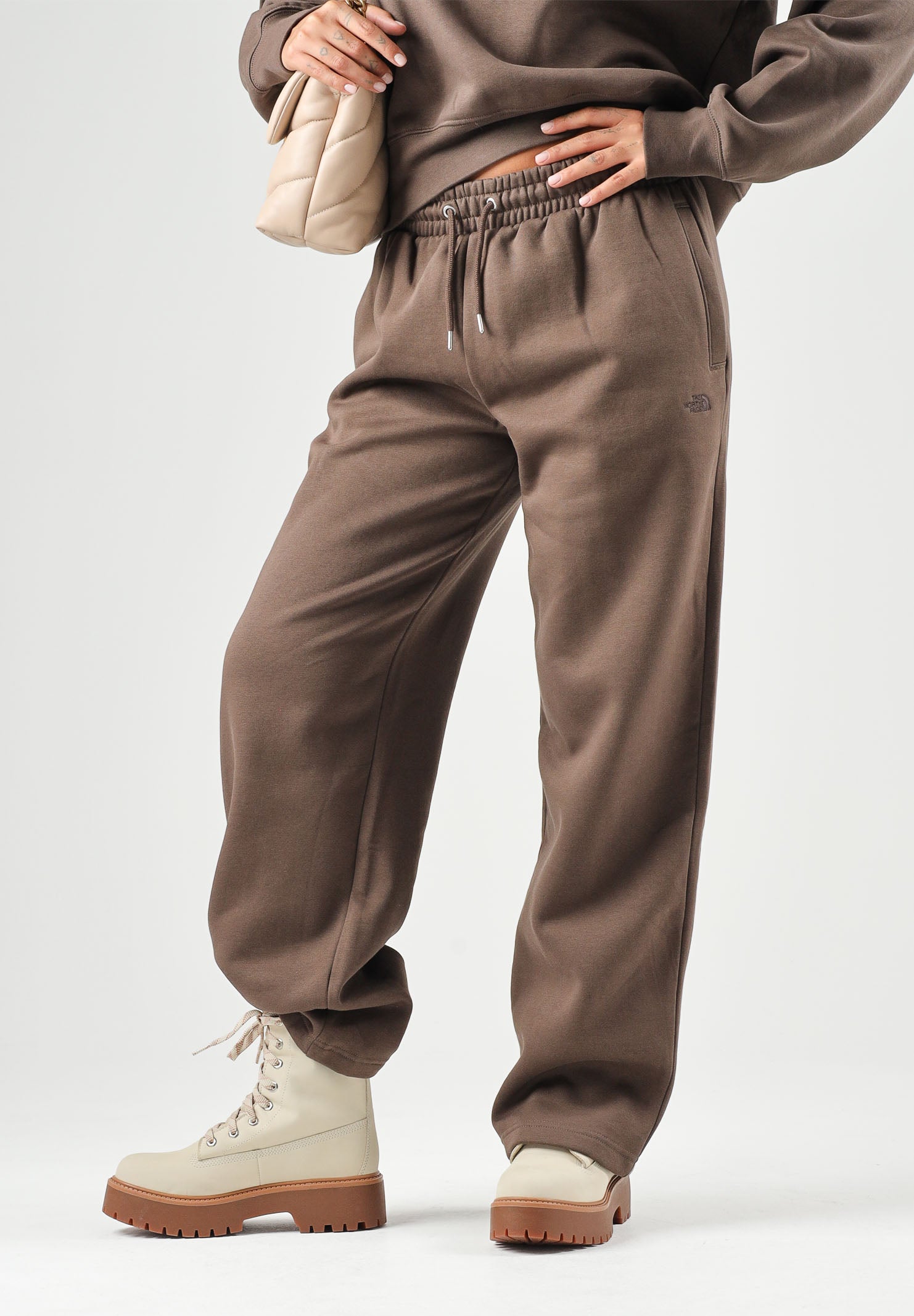 THE NORTH FACE Pantaloni SIMPLE DOME PANT marroni da donna con elastico in vita e polsini alle caviglie. NF0A8CWD1OI1 . THE NORTH FACE 