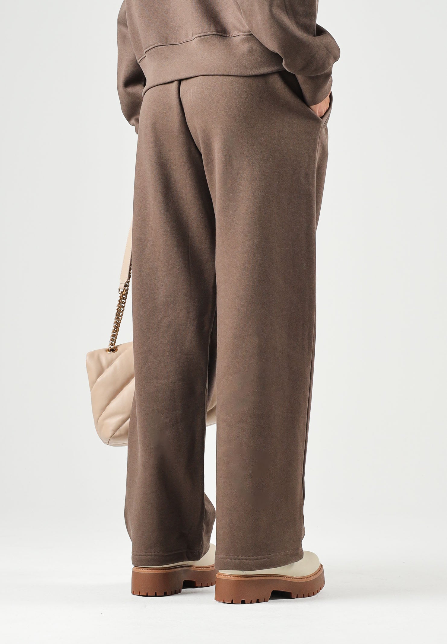 THE NORTH FACE Pantaloni SIMPLE DOME PANT marroni da donna con elastico in vita e polsini alle caviglie. NF0A8CWD1OI1 . THE NORTH FACE 