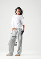 THE NORTH FACE Pantaloni SIMPLE DOME PANT grigio chiaro da donna con elastico in vita e polsini alle caviglie. NF0A8CWDCQO1 . THE NORTH FACE 