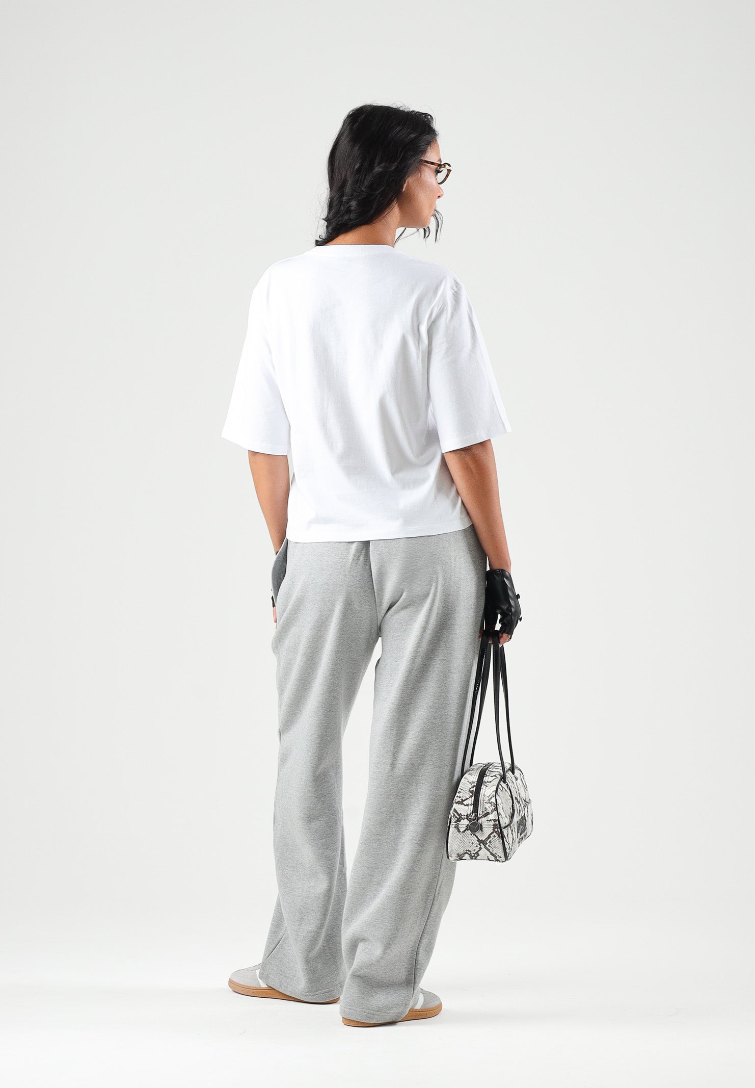 THE NORTH FACE Pantaloni SIMPLE DOME PANT grigio chiaro da donna con elastico in vita e polsini alle caviglie. NF0A8CWDCQO1 . THE NORTH FACE 