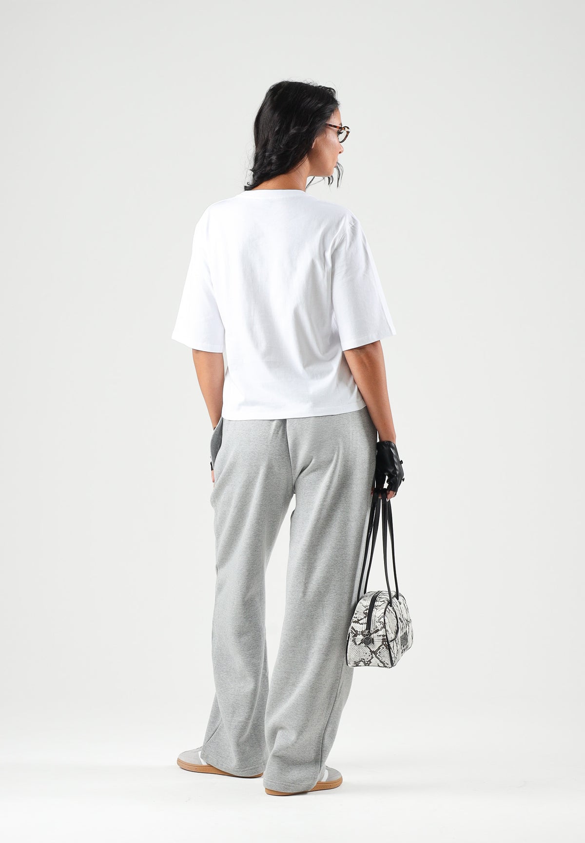 THE NORTH FACE Pantaloni SIMPLE DOME PANT grigio chiaro da donna con elastico in vita e polsini alle caviglie. NF0A8CWDCQO1 . THE NORTH FACE 