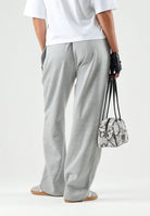 THE NORTH FACE Pantaloni SIMPLE DOME PANT grigio chiaro da donna con elastico in vita e polsini alle caviglie. NF0A8CWDCQO1 . THE NORTH FACE 