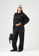 THE NORTH FACE Pantaloni TNF ESSENTIAL SIMPLE DOME neri per donna con vita elasticizzata NF0A8CWDJK31 . THE NORTH FACE 