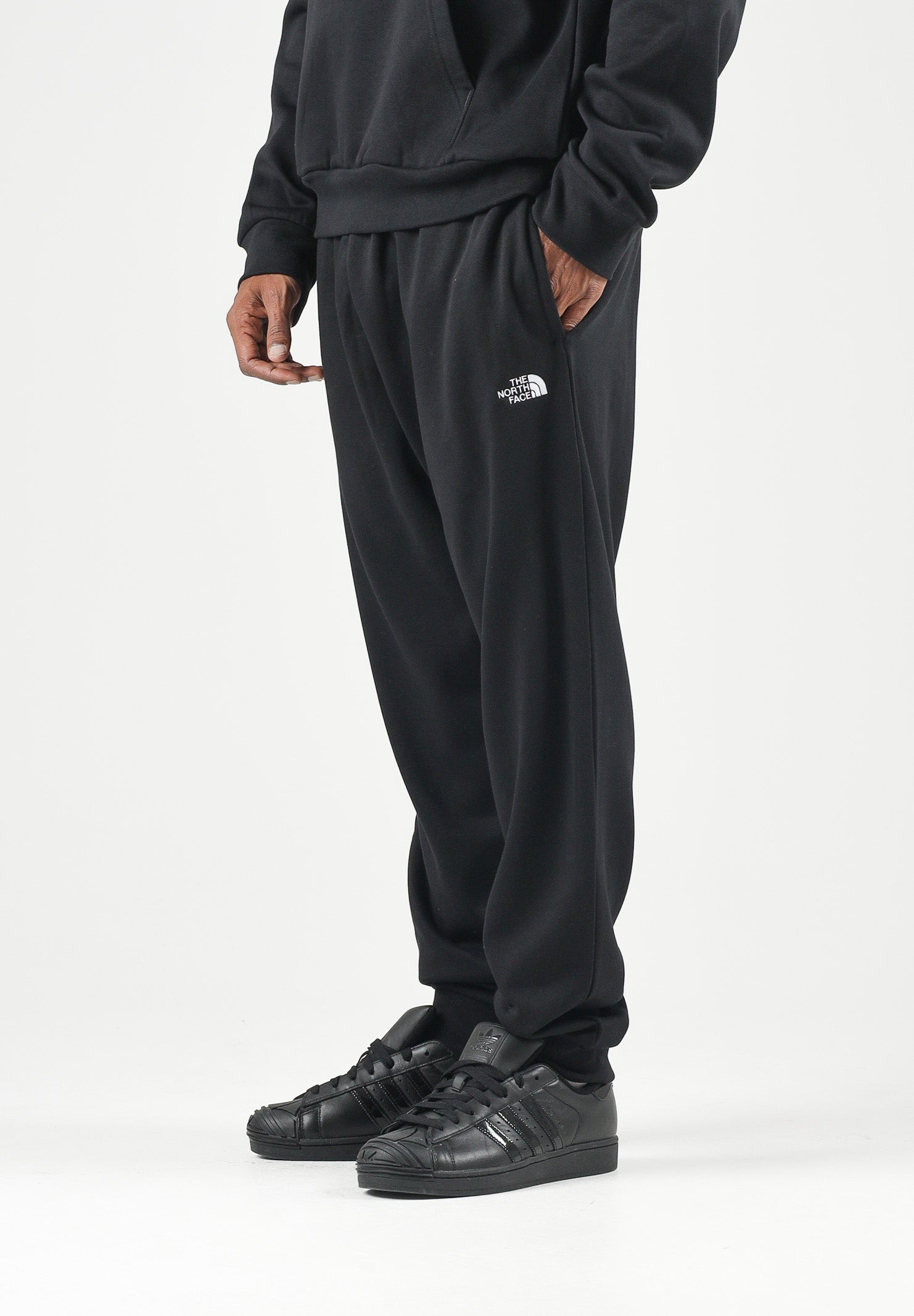 THE NORTH FACE Pantaloni EVOLUTION SIMPLE DOME neri da uomo con mini logo NF0A8CWYJK31 . THE NORTH FACE 