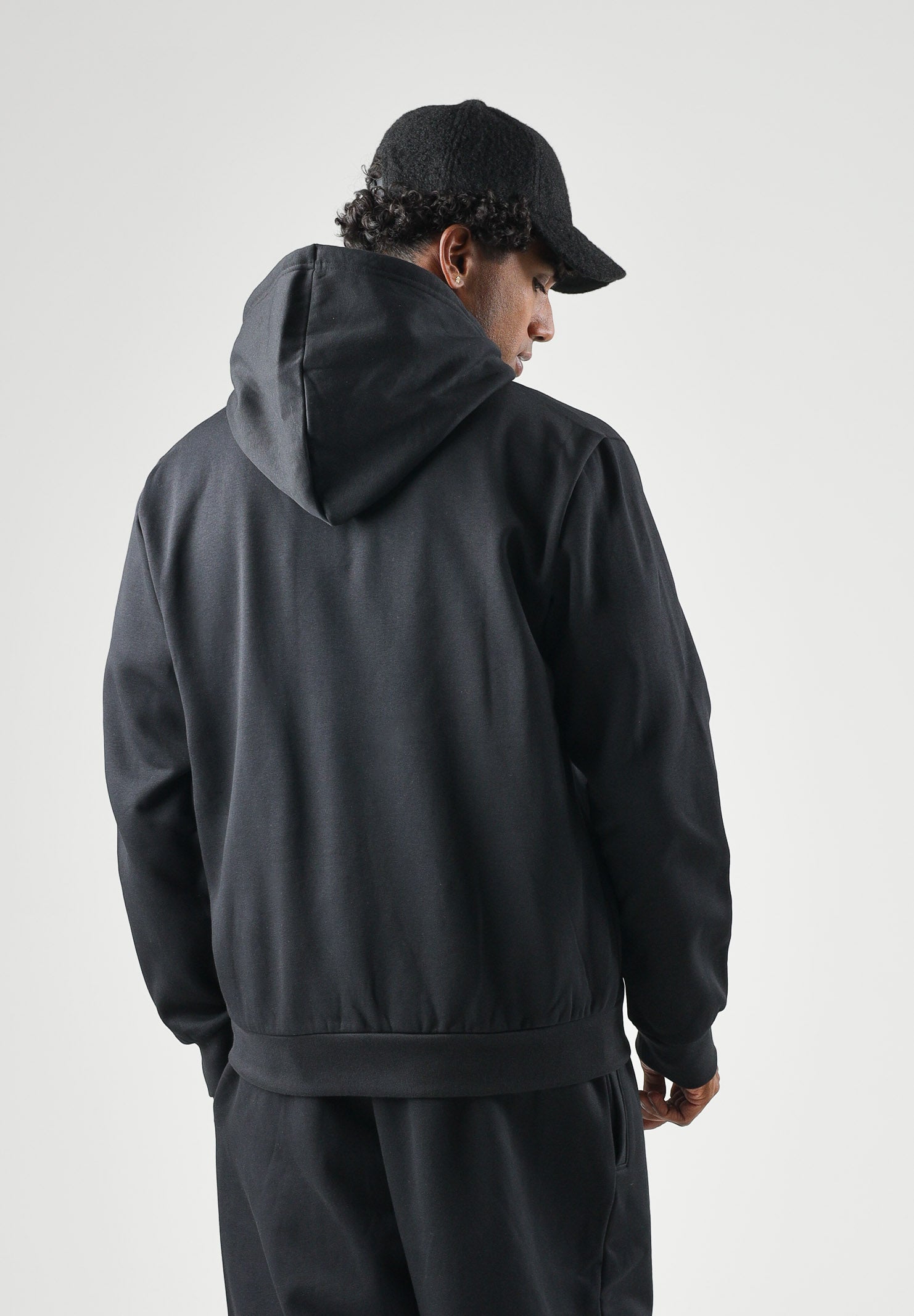 THE NORTH FACE Felpa con zip tnf black nera per uomo e donna  con pratica con cappuccio e tasche laterali. NF0A8EU1JK31 . THE NORTH FACE 