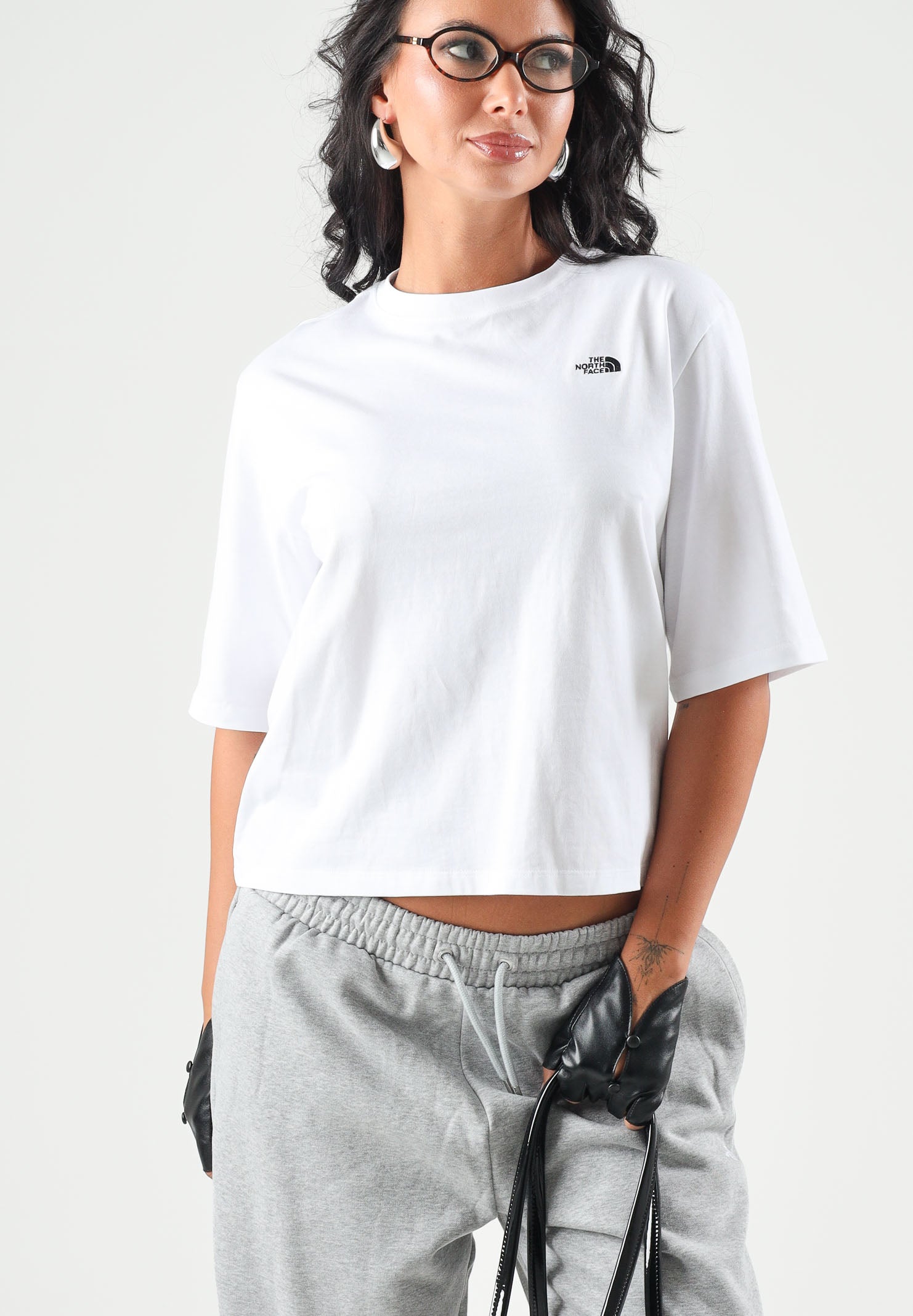 THE NORTH FACE T-shirt manica corta  SIMPLE DOME bianca da donna con piccolo logo stampato sul petto. NF0A8H71FN41 . THE NORTH FACE 