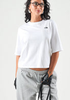 THE NORTH FACE T-shirt manica corta  SIMPLE DOME bianca da donna con piccolo logo stampato sul petto. NF0A8H71FN41 . THE NORTH FACE 