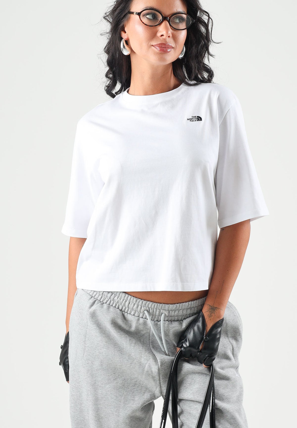 THE NORTH FACE T-shirt manica corta  SIMPLE DOME bianca da donna con piccolo logo stampato sul petto. NF0A8H71FN41 . THE NORTH FACE 