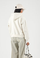 THE NORTH FACE Felpa con cappuccio SIMPLE DOME HOODIE bianco panna da donna con tasca a marsupio frontale. NF0A8HBX3IE1 . THE NORTH FACE 