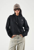 THE NORTH FACE Felpa con cappuccio SIMPLE DOME HOODIE nero da donna con tasca a marsupio frontale. NF0A8HBXJK31 . THE NORTH FACE 