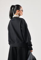 THE NORTH FACE Felpa girocollo SIMPLE DOME CREW nera da donna con logo minimal sul petto. NF0A8HBYJK31 . THE NORTH FACE 